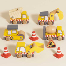 Load image into Gallery viewer, Set of wooden toy construction vehicles on a beige background

