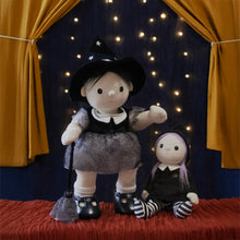 Load image into Gallery viewer, Two dolls in costumes on a stage with yellow curtains and string lights.
