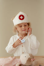 Load image into Gallery viewer, Child playing with doctor play set
