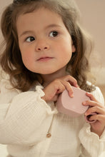 Load image into Gallery viewer, Young girl playing with a pink little dutch dressing table hair brush
