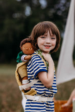 Load image into Gallery viewer, Child with an Olli ella doll in an olli ella carrier.
