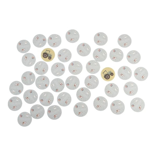 Set of round stickers with tractor designs on a white background