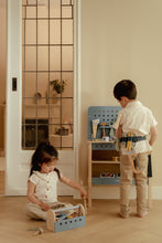 Load image into Gallery viewer, girl playing with Little dutch Wooden toy toolbox with tools  and boy playing with toolbelt and workbench
