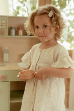 Load image into Gallery viewer, Young girl holding a pink bowl in a play kitchen setting
