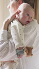 Load and play video in Gallery viewer, A plush wrist rattle featuring a fox design with a seagull motif on top. It includes crinkly parts and a label, designed for babies.
