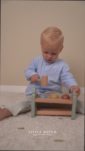 child playing with Little Dutch Pounding Bench with Rolling Balls