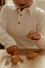 Load image into Gallery viewer, Boy playing with Little Dutch Slicing Vegetables and cutting vegetables 
