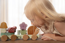 Load image into Gallery viewer, Girl playing with Fairy Garden Hedgehog Stacking Train
