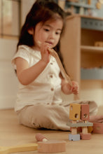 Load image into Gallery viewer, girl playing with Little dutch Wooden toy toolbox with tools 
