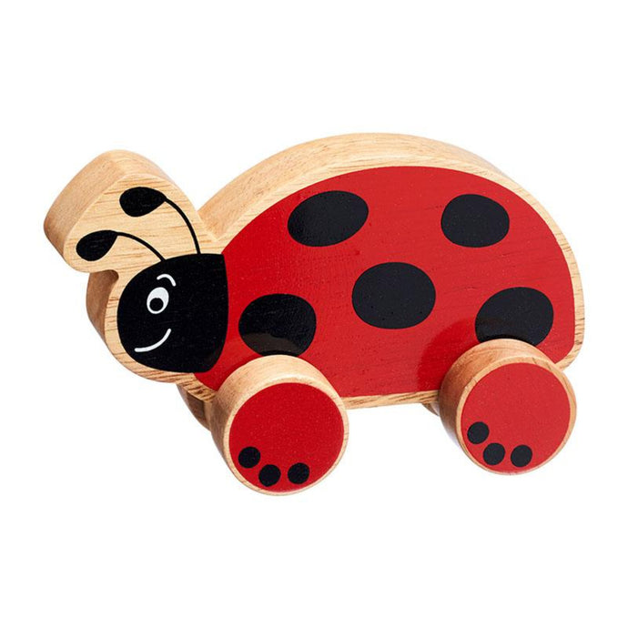 chunky wooden ladybird push along, bright, double sided, colourful design natural wood edge. baby or toddler's imagination flowing helping them to develop their fine motor skills, hand eye co-ordination and imaginative play. recommended play age is 1-5 years old. fair trade handcrafted sustainably sourced rubberwood and non toxic paints. Wooden toys, educational toys, preschool toys, colours, animals, learning, learning through play, pre school, toddler toys, Lanka Kade, Good Little Egg