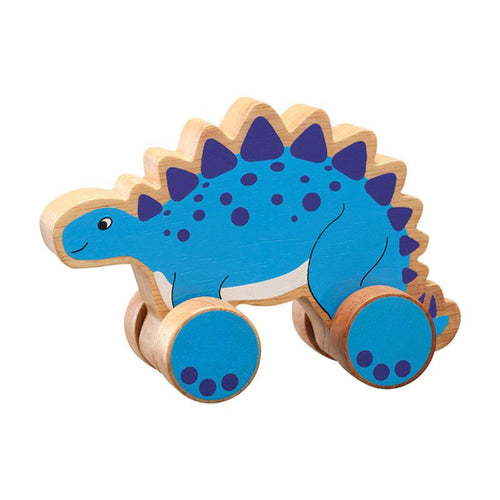 chunky wooden Stegosaurus push along, bright, double sided, colourful design natural wood edge. baby or toddler's imagination flowing helping them to develop their fine motor skills, hand eye co-ordination and imaginative play. recommended play age is 1-5 years old. fair trade handcrafted sustainably sourced rubberwood and non toxic paints. Wooden toys, educational toys, preschool toys, colours, animals, learning, learning through play, pre school, toddler toys, Lanka Kade, Good Little Egg