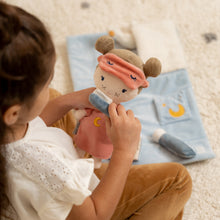 Load image into Gallery viewer, Girl playing with Rosa doll in a sleepover
