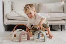 Load image into Gallery viewer, boy playing with the Rainbow Stacker - Vintage
