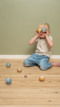 Load image into Gallery viewer, Boy playing with Little Dutch Boules Balls Set
