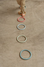 Load image into Gallery viewer, Child playing at standing in the Little Dutch Activity Rings
